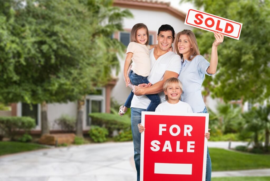 happy-family-four-with-sale-sign(1)